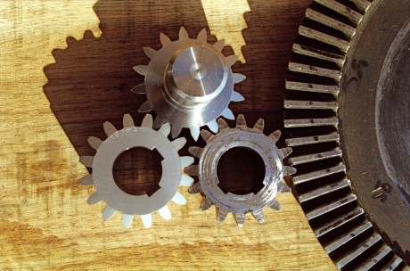 Pinion gears and crown wheel